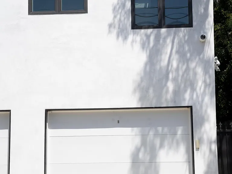 parking garage for one car and space behind for another