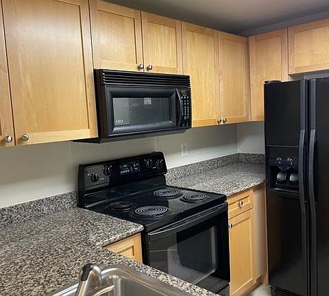 Kitchen with granite countertops