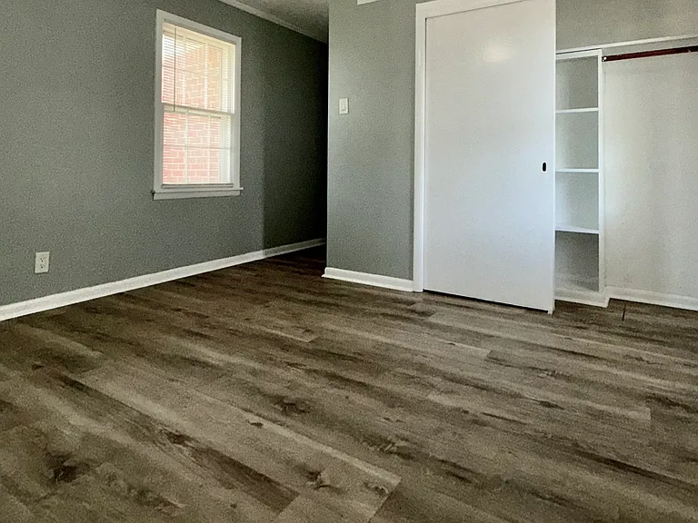 The master bedroom as it leads to the main hallway.