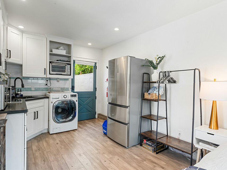 Well-stocked and ready for your stay enjoy a full-size fridge, open shelving, and thoughtful touches like extra linens and games. Just bring your suitcase!