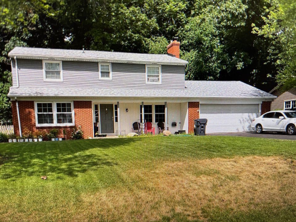 Front view of home - 2 car attached garage w/ additional parking