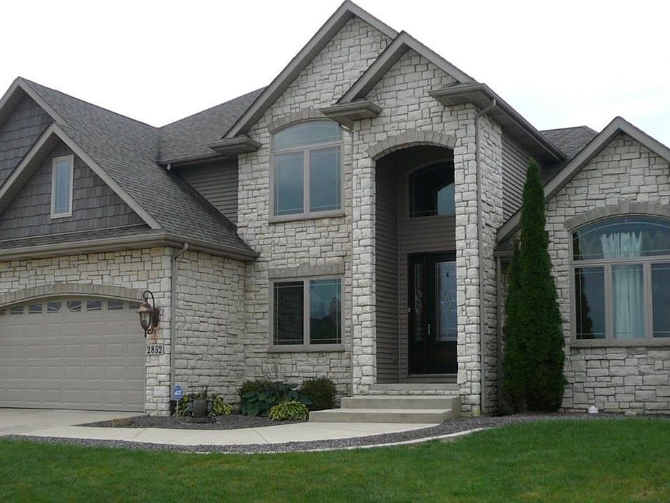 Custom built cape cod in one of Valparaiso's most desirable neighborhoods - Tuscany!