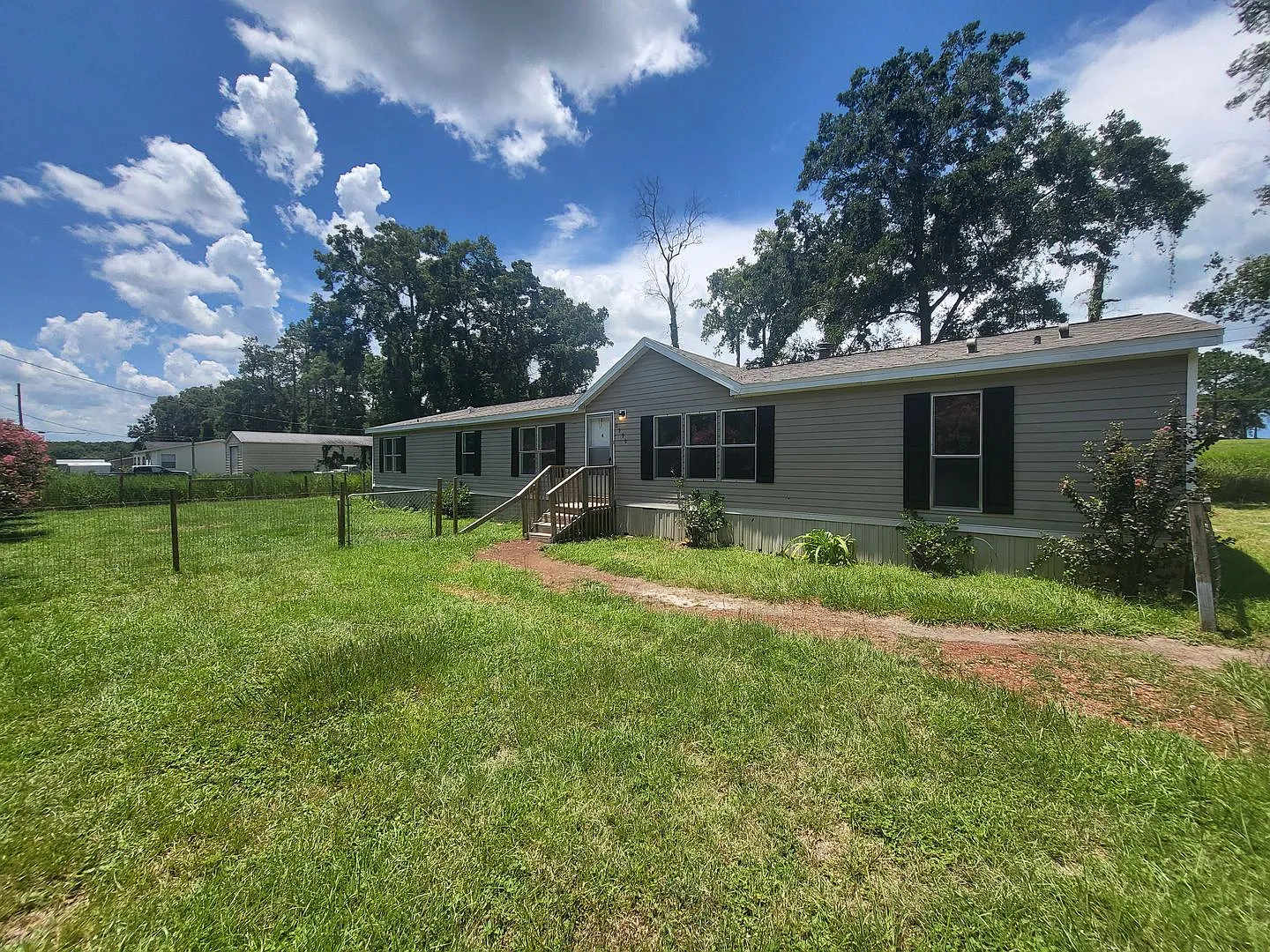 This 4 bedroom, 2 Bath has 2,300 sq. ft. of living space on 1/3 Acre! — Photo 1