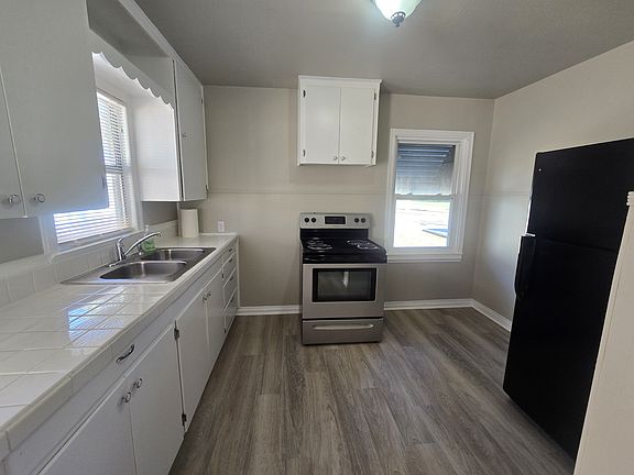 Oven, stove, and fridge included. Lots of cabinets and counter space.
