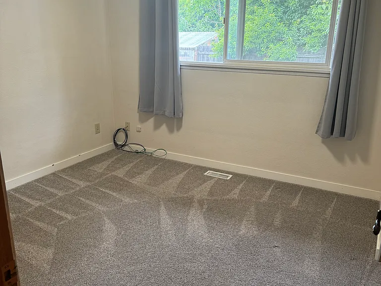 smaller of 3 bedrooms