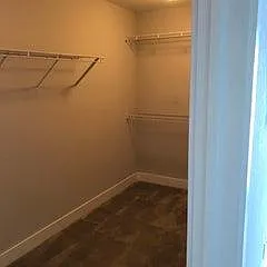 Master bedroom 1 has a large walk-in closet which can be accessed from the bedroom or from the adjoining laundry room.