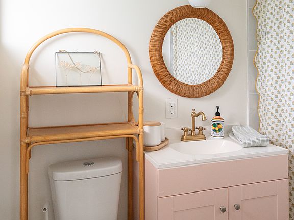 Full bathroom with tub/shower combo.
