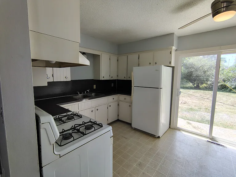 Kitchen, New floor coming.