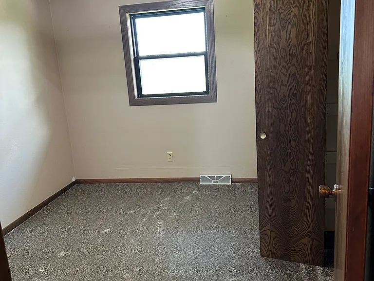 Bedroom 1, smallest of the 3 on the main floor.