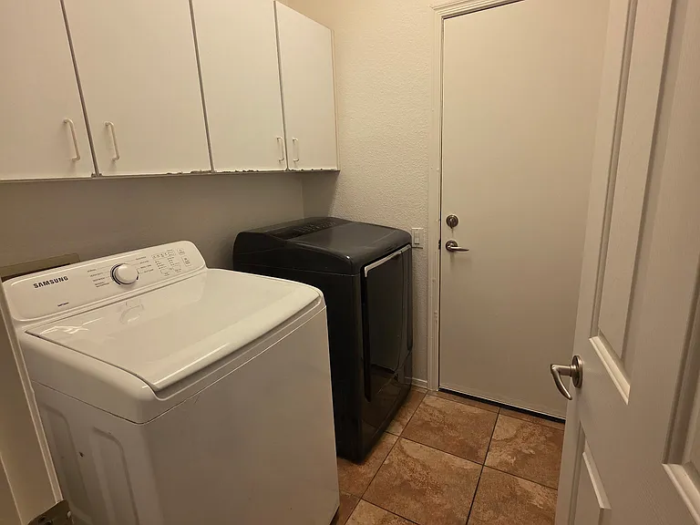 Laundry room with washer and dryer