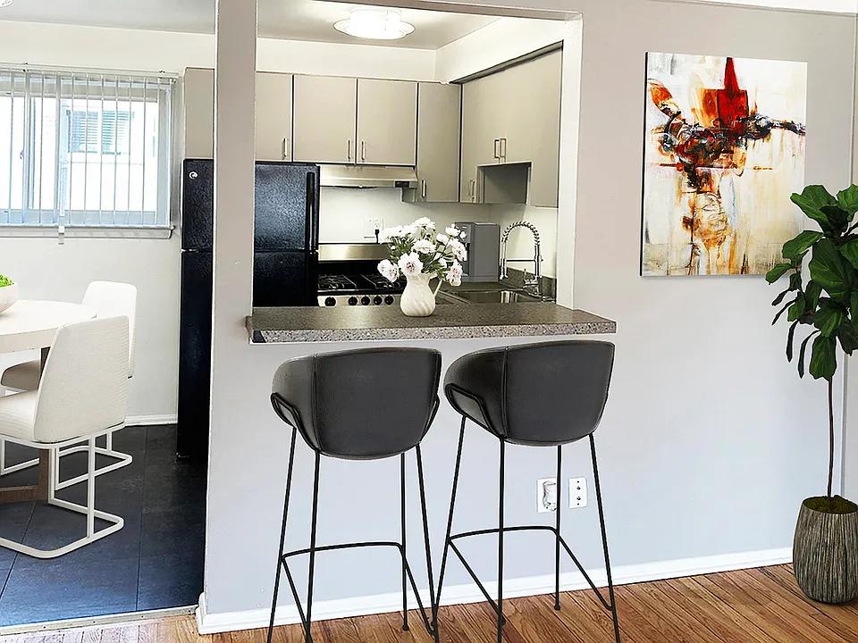 WIndowed nook, bistro dining bar, cool grey cabinets, stainless or jet black appliances.