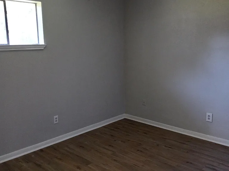 Comfy primary bedroom with huge walk in closet and bath.