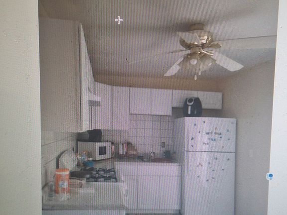 Tis one part of the kitchen that has French door that lead on the the ramp around deck and a beautiful view of the backyard.