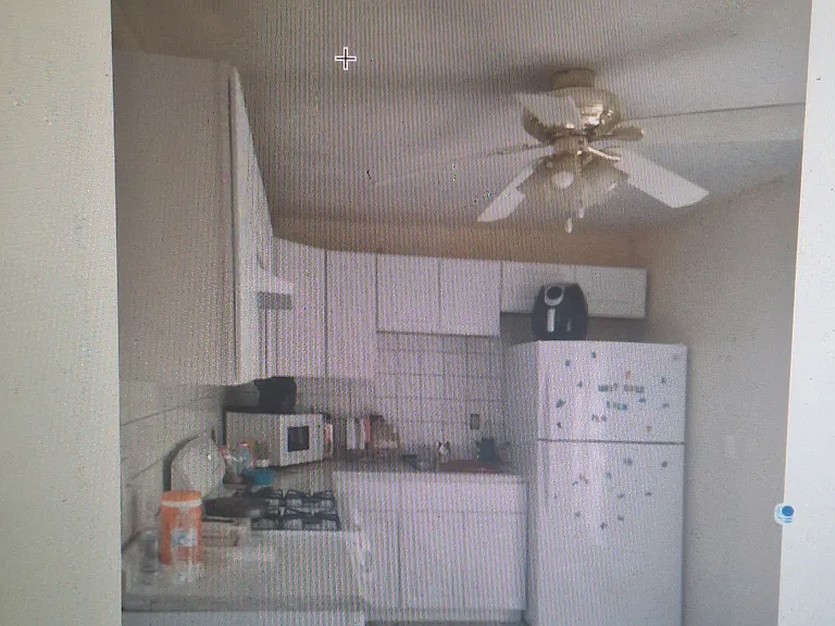 Tis one part of the kitchen that has French door that lead on the the ramp around deck and a beautiful view of the backyard.