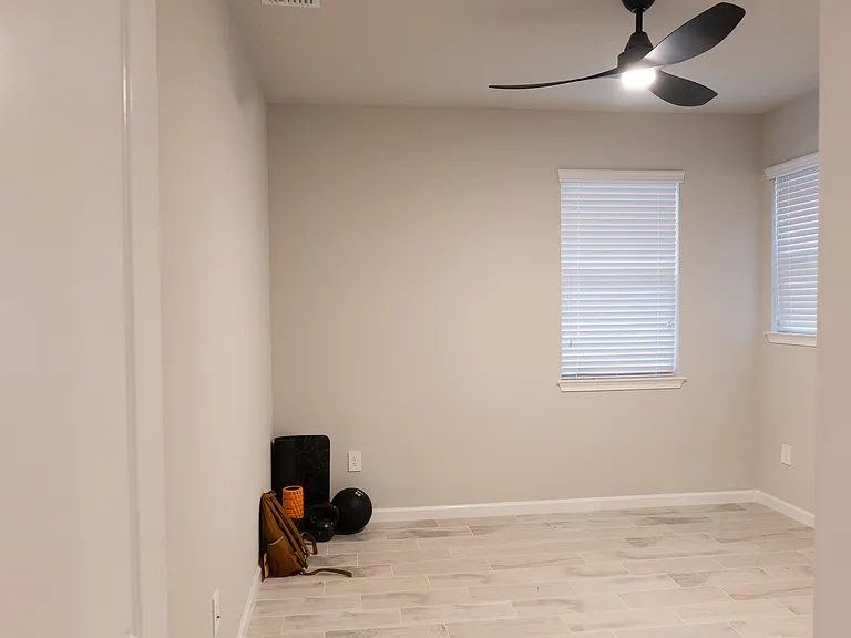 Second Bedroom, utilized as a workout/ gym space.