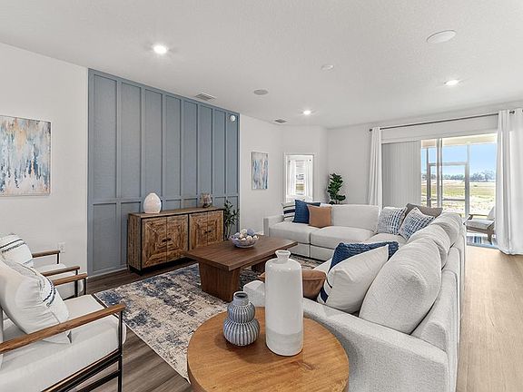 The gathering room easily fits a sectional, or other furniture layouts - Westin II by Highland Homes