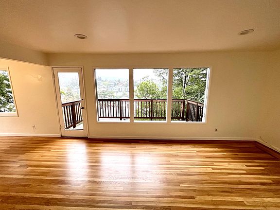 Living room with access to private deck