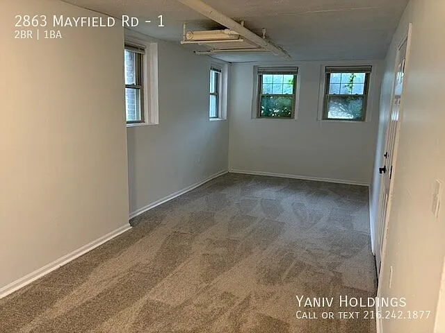 Spacious Garden-Level 2BR Heat & Water Included — Photo 1