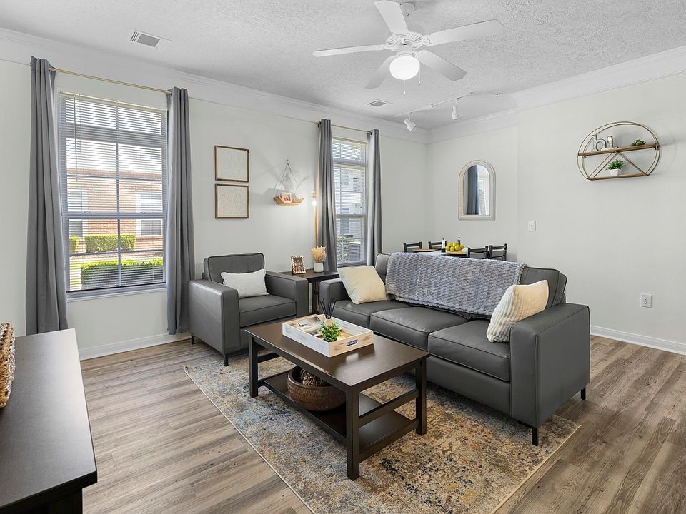 Relax in your modern, fully furnished living room at The Quarters, off-campus housing near UL Lafayette.