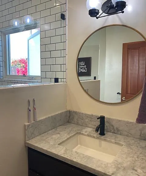 Guest bathroom sink, carrara marble countertops