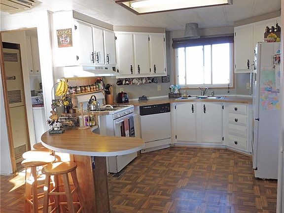 Lots of light and this bright kitchen opens into the dining area.