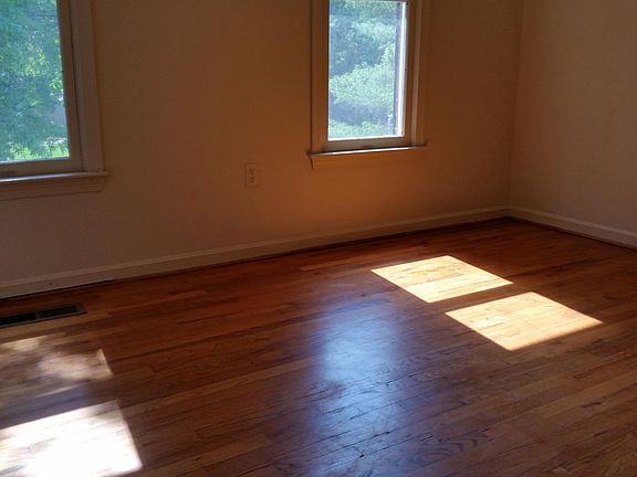 Living room with two of three windows.