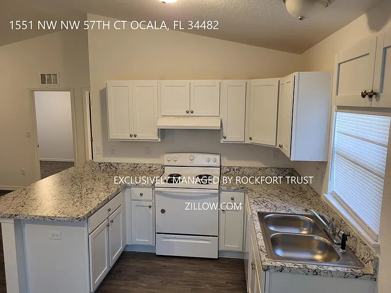 1551 NW 57th Ct — Photo 5