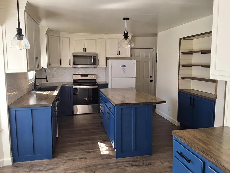 7620 Hammersley Rd — Photo 3
