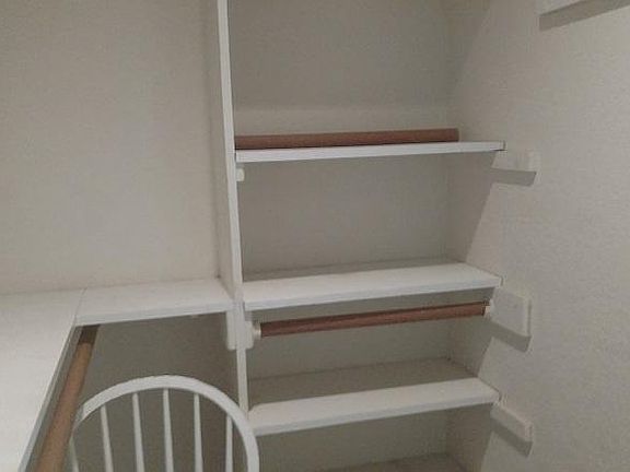 walk-in closet to bedroom