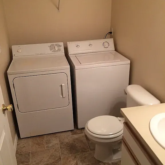 1/2 bathroom and laundry downstairs