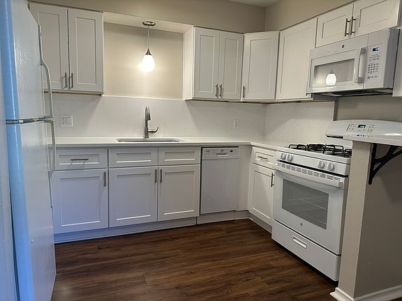 Kitchen with new cabinets and quartz countertops