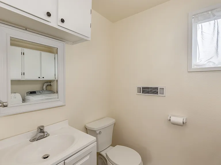 Lower level | half bath with washer dryer | additional storage