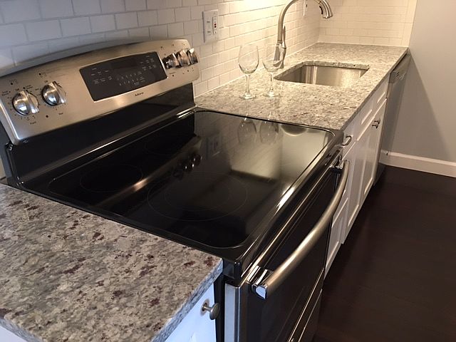 new kitchen with granite