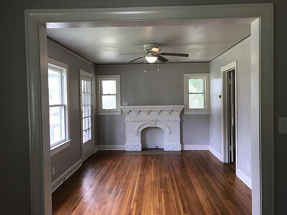 Pretty hardwoods, bright cheerful living room.