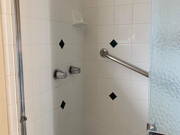 En suite bathroom shower.