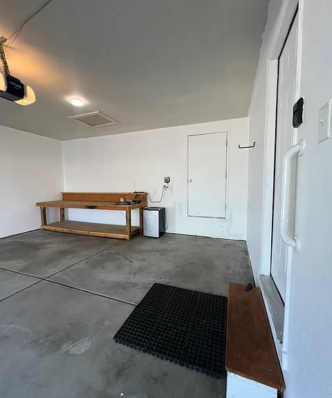 2-car (deep) garage, 20 ft x 19 ft - workbench included