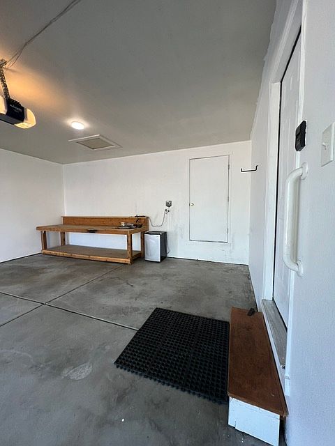2-car (deep) garage, 20 ft x 19 ft - workbench included