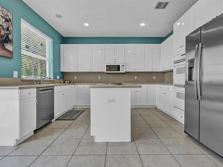 10290 NW 60th Pl — Photo 32