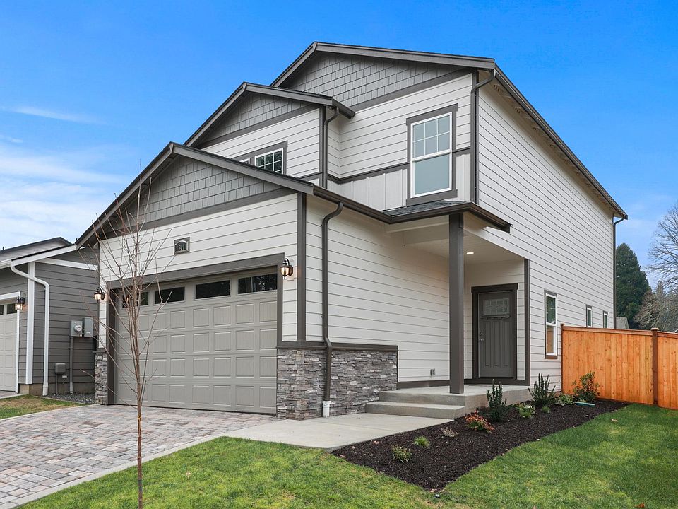 Attached garage, off street parking and the front door