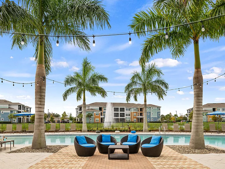 Shimmering pool and outdoor lounge