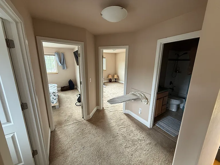 Hallway with built-in ironing board