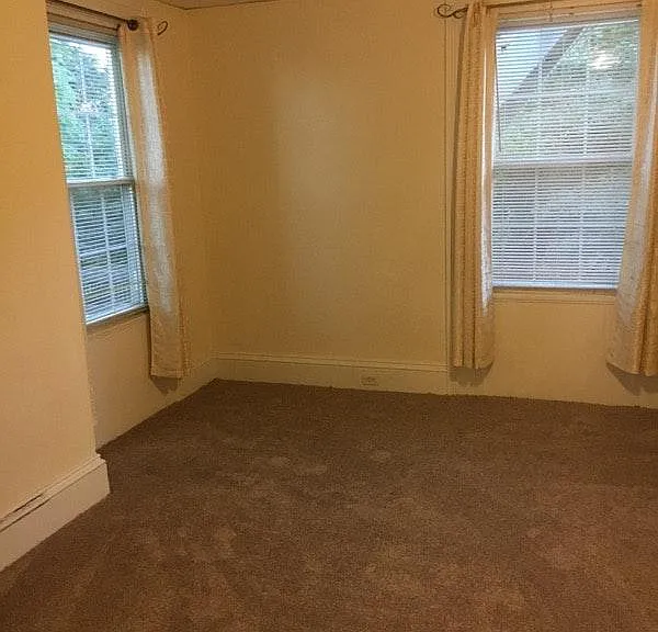 Spacious bedroom with closet and ceiling fan