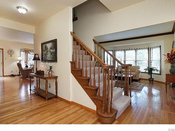 Gleaming Hardwood Floors & Spacious Front Hallway