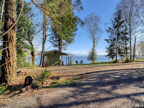 The view as you come down the drive to the parking area - to the left is the staircase that leads you to waterfront paradise.
