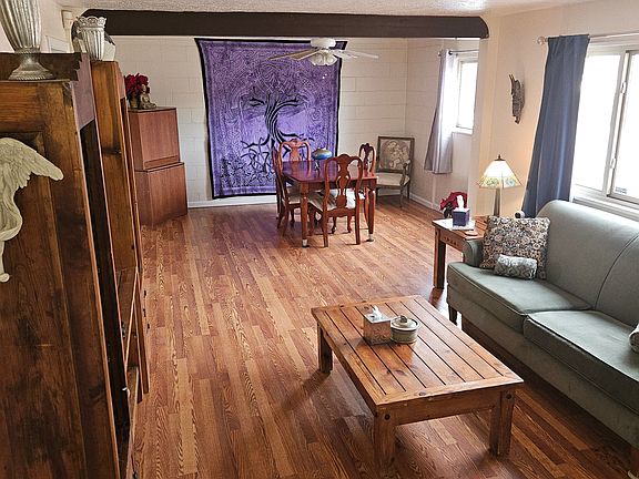 Contemporary Southwestern, new laminate oak flooring