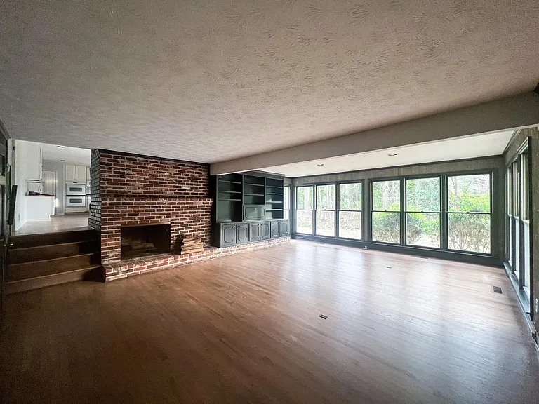 The huge light filled den is perfect for gathering with friends and family.