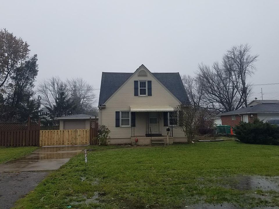 Front - huge yard. House located on double lot - completely fenced in.