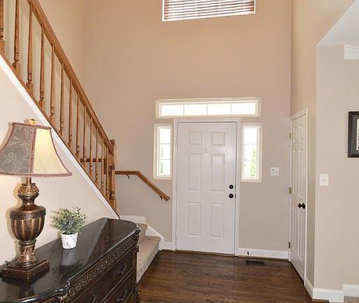 2-story foyer, with remote-controlled blinds!