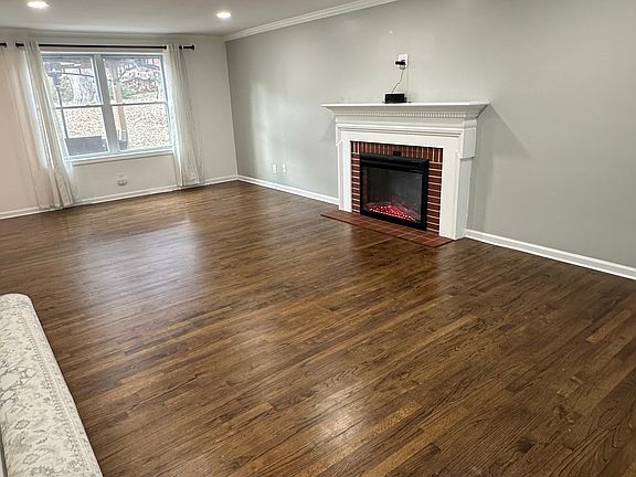 Large living room with lots of natural light.