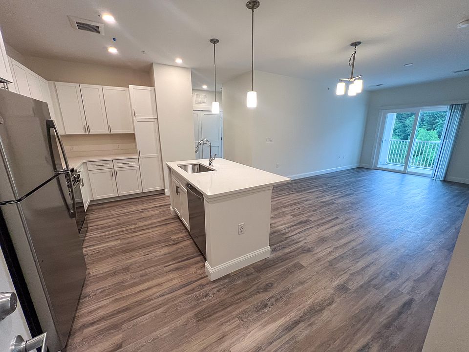 View of living room and private deck